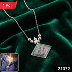 Oxidised silver pendant necklace showing charm and detailed metal chain