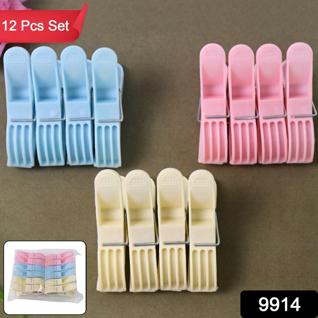 Assorted brightly colored plastic cloth clips spread out for household use