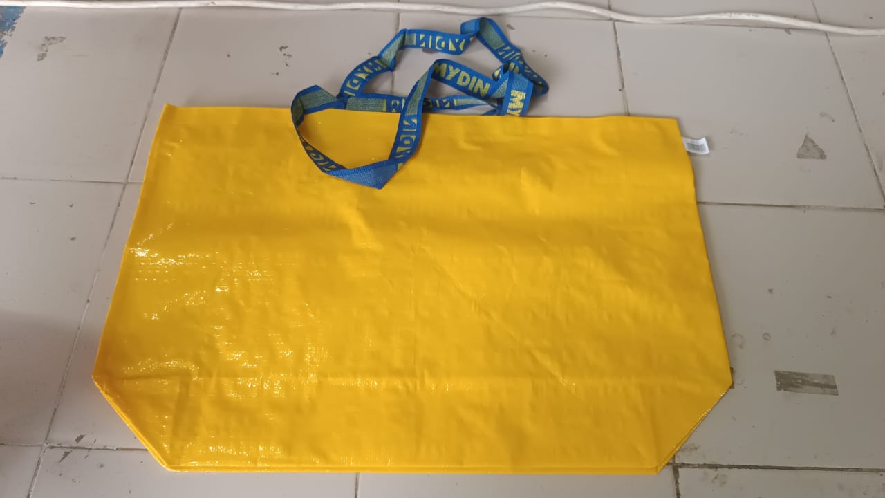 Multi-angle views of the large eco-friendly reusable shopping tote bag