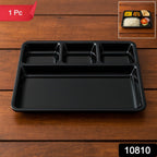Black plastic 4-section rectangular meal tray with raised edges to prevent spills.