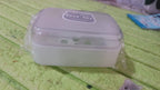 Durable plastic soap dish with a simple pattern, designed for longevity.