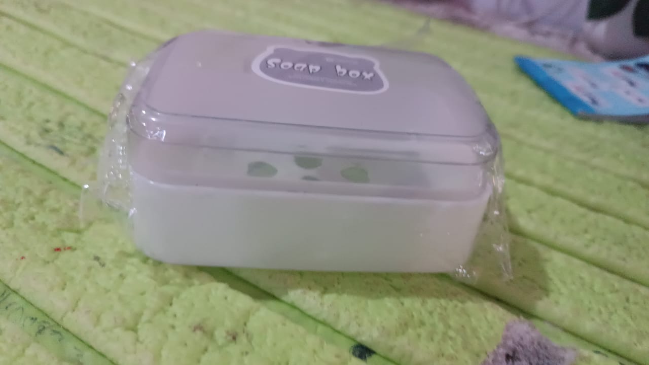 Durable plastic soap dish with a simple pattern, designed for longevity.