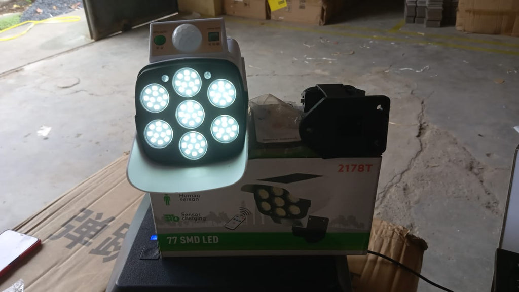 Packaging for the AutoSafeo solar outdoor motion sensor dummy security light.