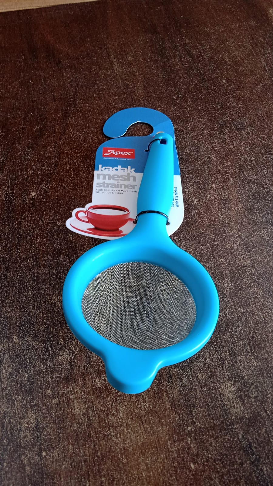 Kadak mesh strainer placed in kitchen setting ready for use