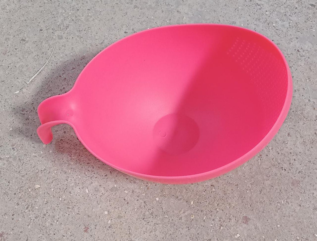 Versatile rice washing bowl with a robust drain basket and handle for efficient food preparation.
