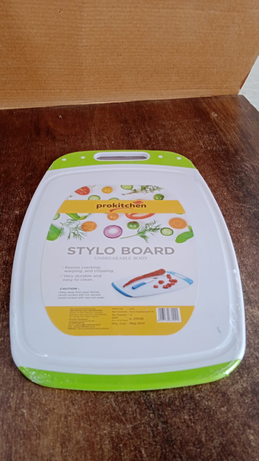 A versatile plastic chopping board fitting seamlessly into a contemporary kitchen setup.