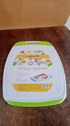A versatile plastic chopping board fitting seamlessly into a contemporary kitchen setup.