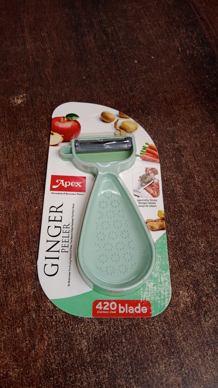 Side view of Apex ginger peeler with built-in grater for garlic and ginger