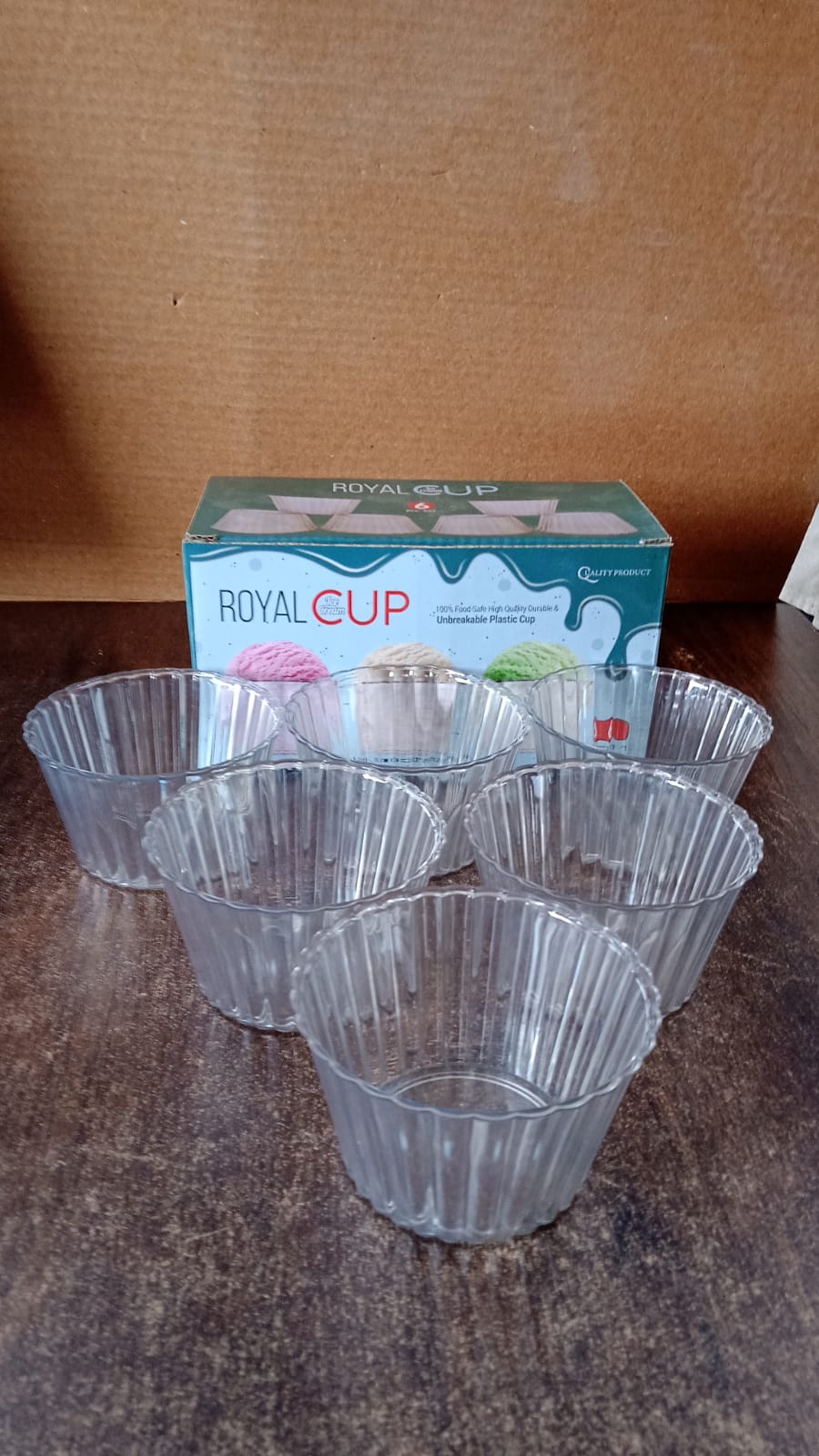 Clear plastic dessert bowls arranged for serving at parties