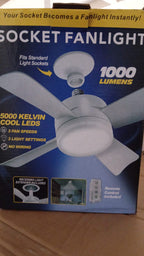 Room setup showing ceiling fan and LED light in use