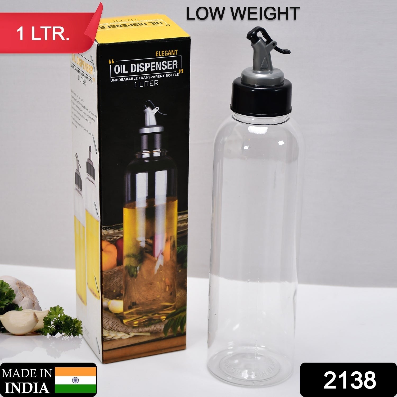 Ergonomic 1L oil dispenser with clear body and controlled pouring spout.