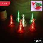 Mini battery operated LED Christmas tree lights in cone shape with glowing star tops