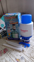 Versatile manual water hand press pump suitable for dispensing water from large bottles in home or office.