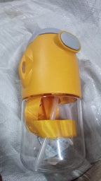 The portable water bottle with its adjustable strap hanging from a backpack, ready for travel.