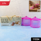 Transparent dry fruit storage jar on kitchen counter showcasing snacks