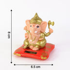Angled image of Lord Ganesh Idol with subtle lighting enhancing statue details