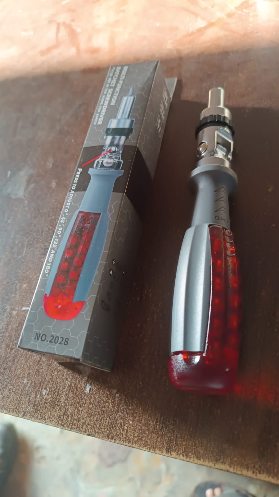 Lifestyle shot of the ratchet screwdriver set being used for a home repair task.