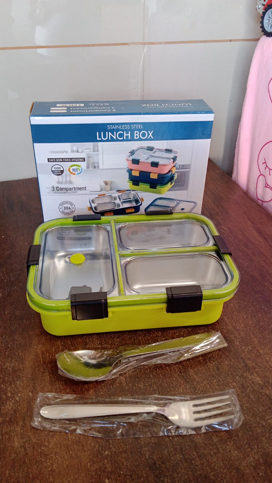 Top view showcasing the transparent, leak-proof layered lids of the tiffin box.