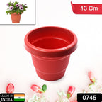 Durable black plastic plant container, 13cm, for indoor plants or balcony gardens.