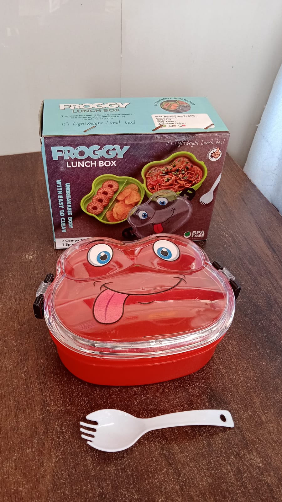 Froggy-shaped leakproof lunch box for kids, perfect for packed meals.