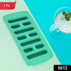 Close-up of the ice tray filled with water, showing individual compartments for freezing.