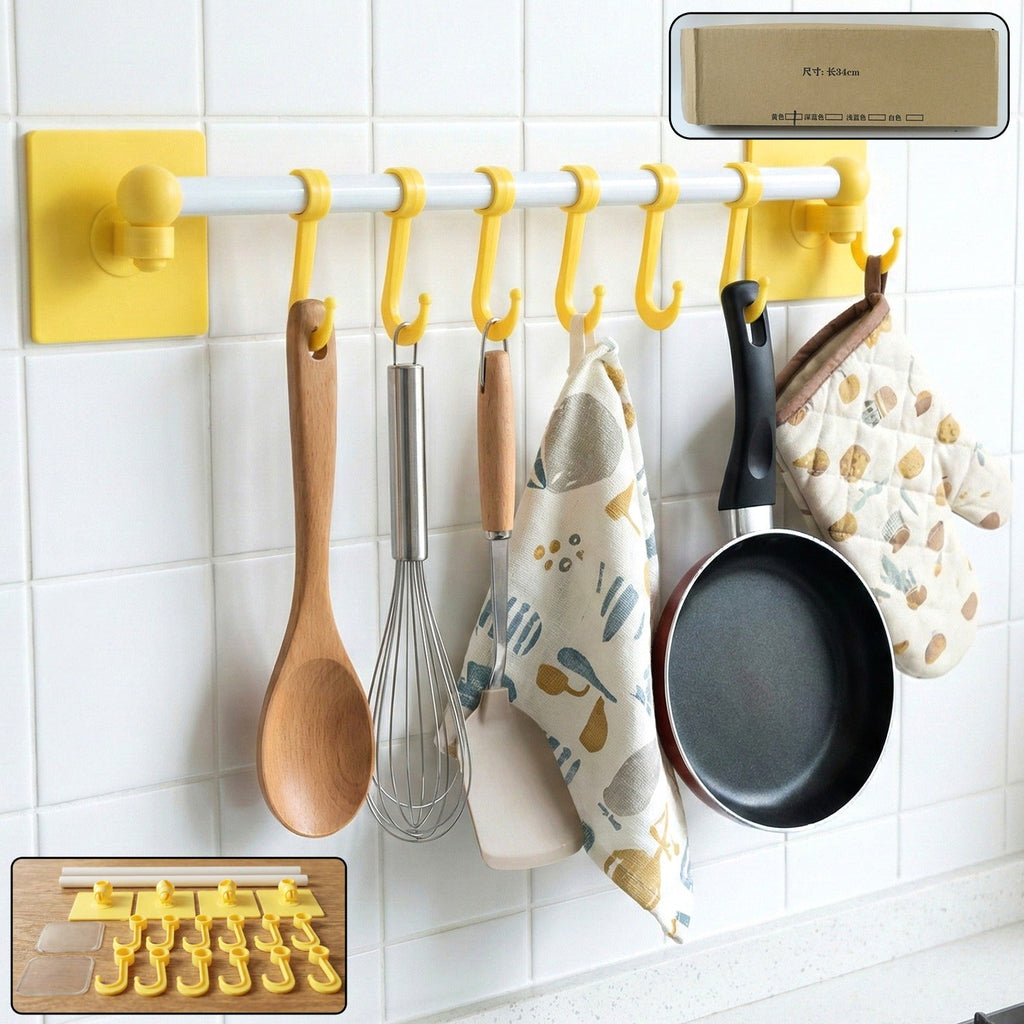 Wall mounted kitchen rack with adhesive hooks holding kitchen accessories