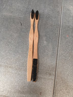 Additional view of bamboo toothbrush with eco-friendly branding