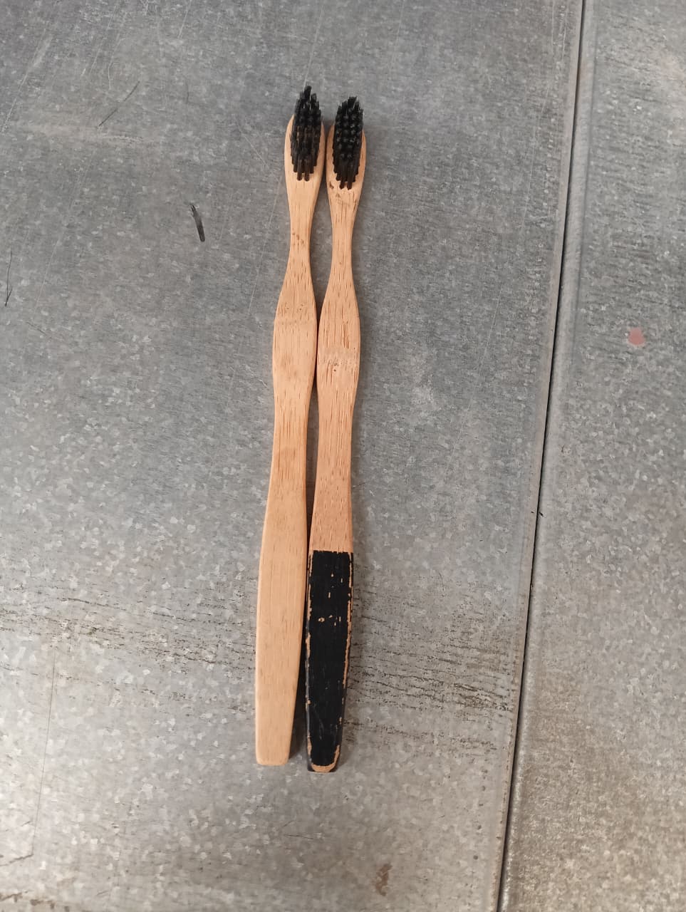 Additional view of bamboo toothbrush with eco-friendly branding