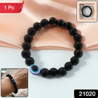Close-up of smooth glossy dual-tone crystal-style beads on stretchy bracelet