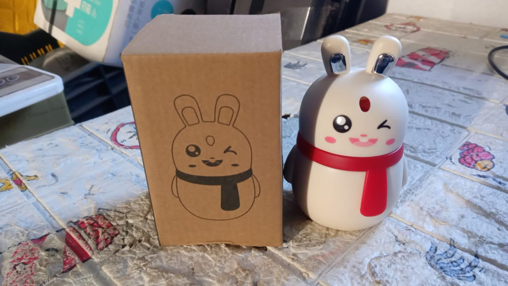 Another angle of the red rabbit toothpick dispenser, ready for use as a hygienic toothpick storage solution.