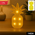 Battery operated pink pineapple decorative LED night light on table