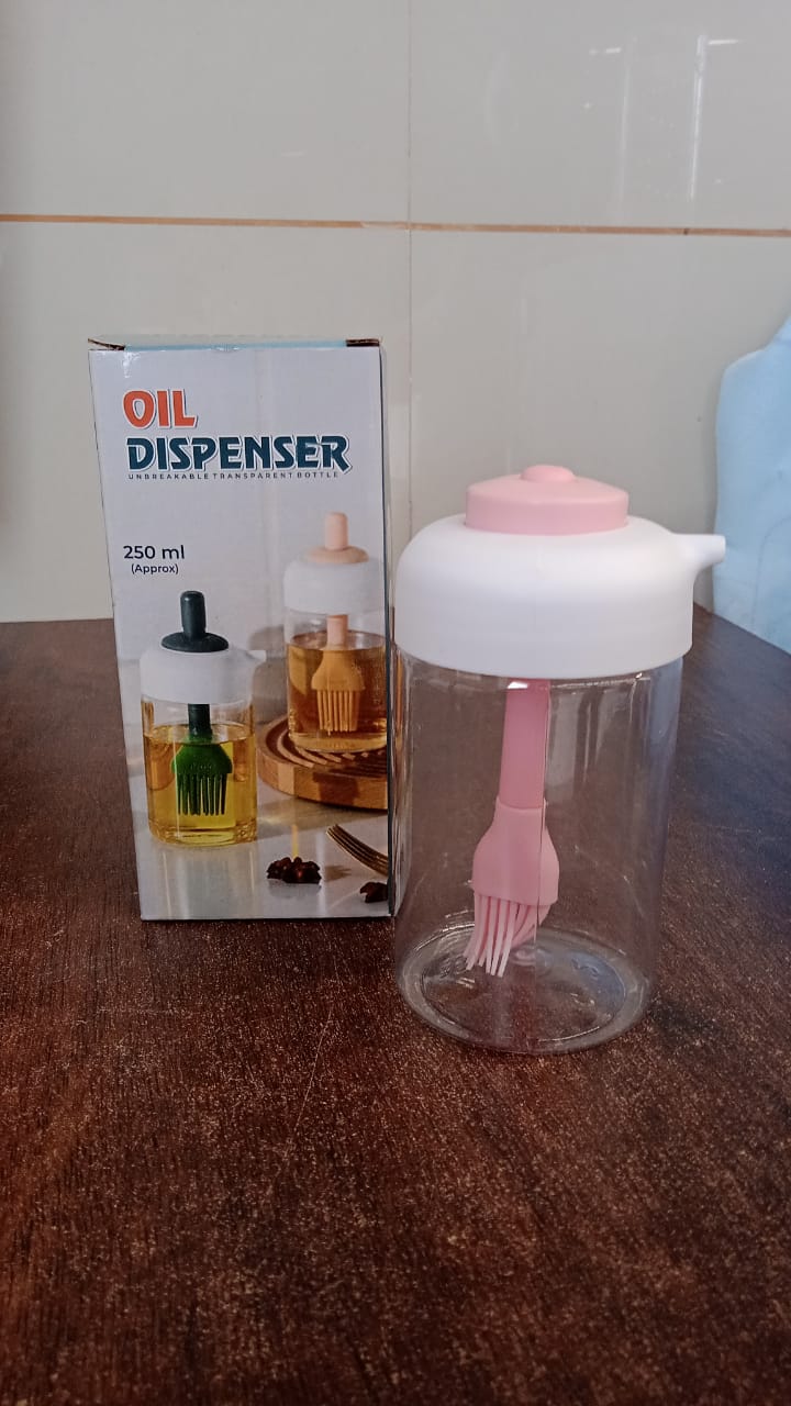 Modern kitchen setting featuring the 2-in-1 oil dispenser with silicone brush.