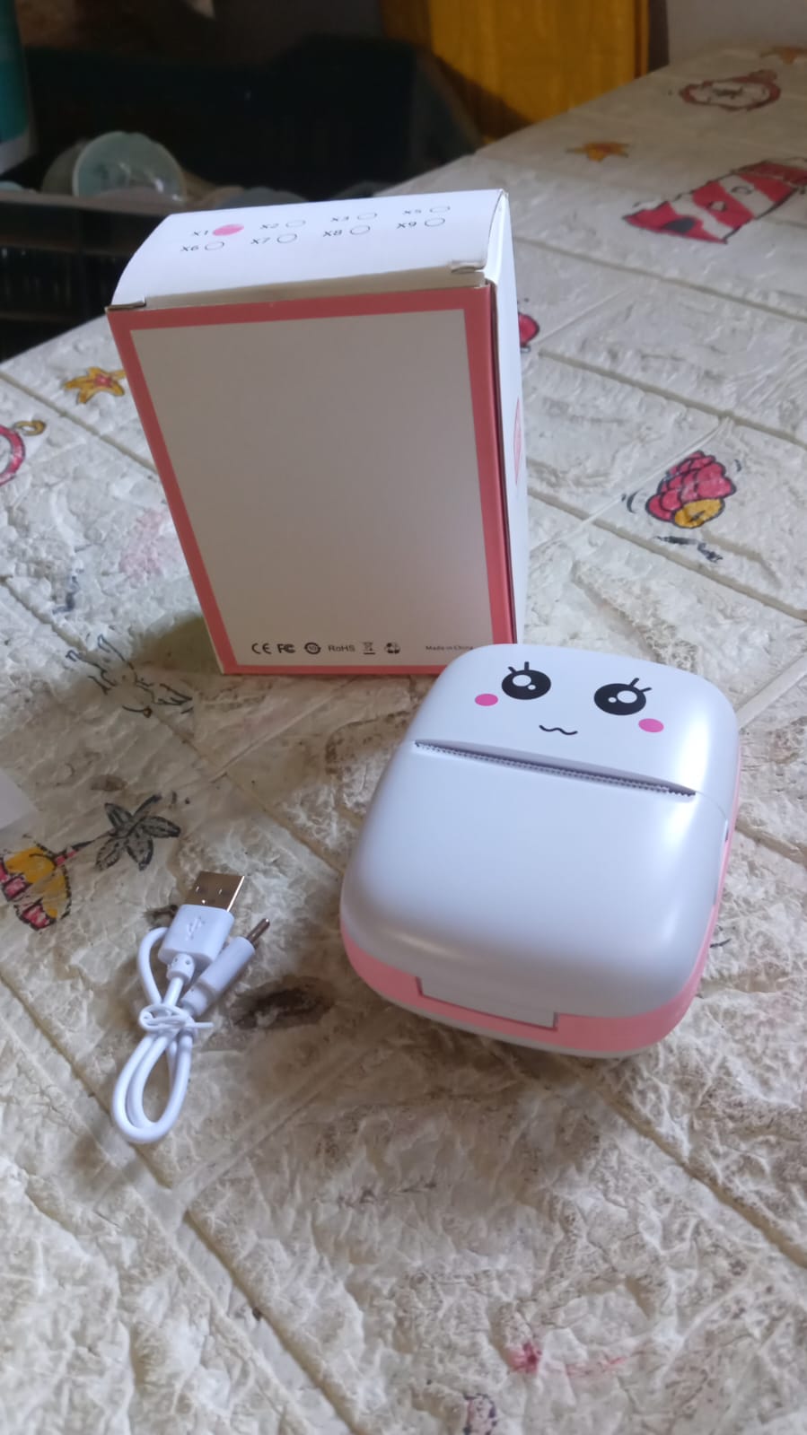 Back view of the Voltronic Pocket Mini Printer, showing its minimalist design.