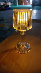 Crystal desk lamp displayed in a home setting.
