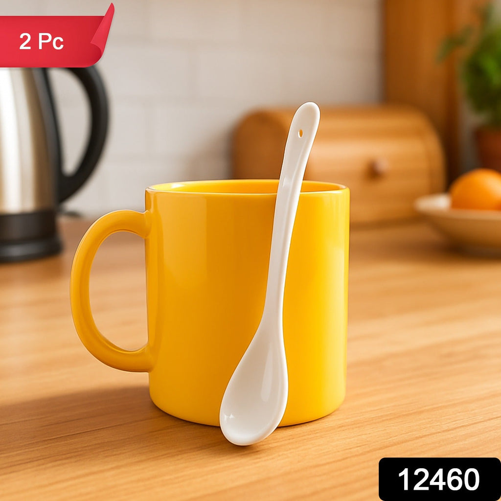 Set showing the plastic mug with ergonomic handle and matching spoon