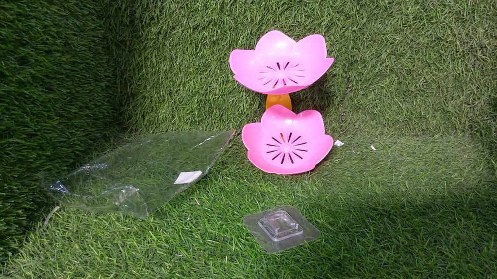 The self-draining soap dish with floral design, keeping a soap bar perfectly dry.