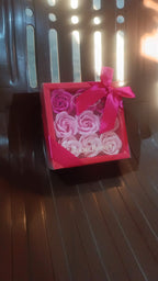 Decorative rose-shaped soap bars in a floral scent gift box presentation