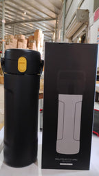 Insulated water bottle in use, ideal for outdoor hydration with leak-proof cap