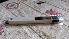 Complete view of the 2-in-1 window slot cleaning brush and dustpan, showcasing its versatile design.