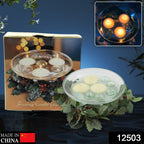 Elegant floating candle holder used as stylish table decor.