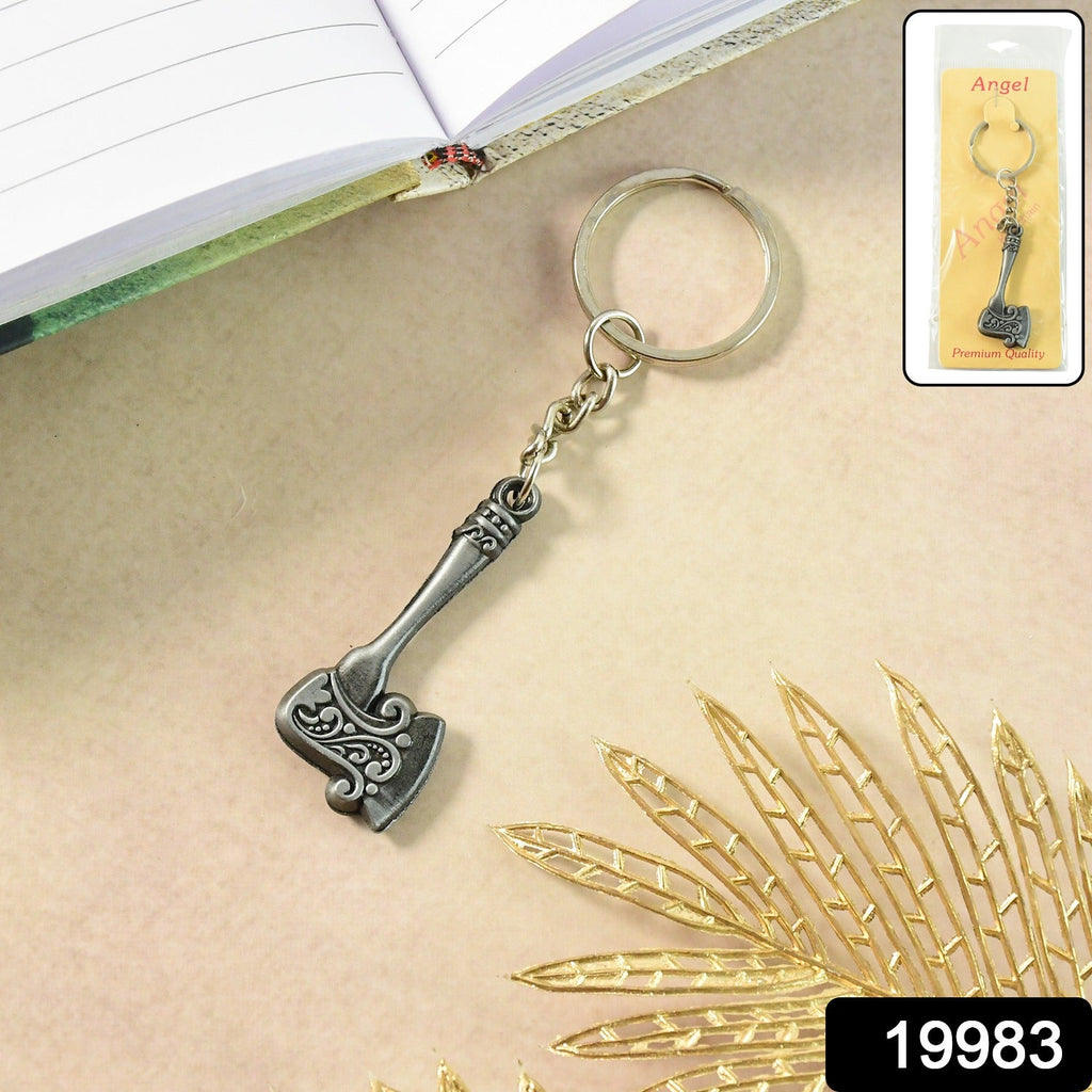 Close-up of a metal axe keychain highlighting rugged antique design
