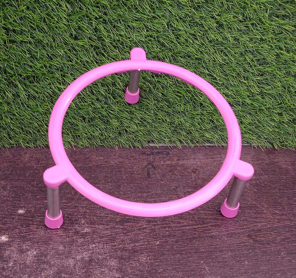 Stainless steel matka stand with a fruit basket placed on top.