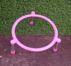 Stainless steel matka stand with a fruit basket placed on top.