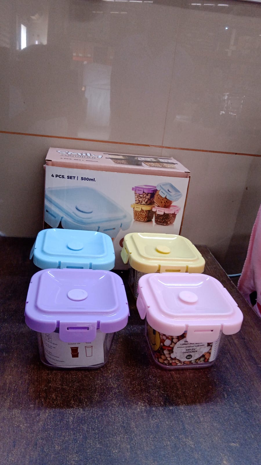 Different coloured BPA-free food storage containers keeping snacks fresh for the day.