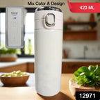 The vacuum insulated water bottle holding a steaming hot beverage, emphasizing its temperature retention.