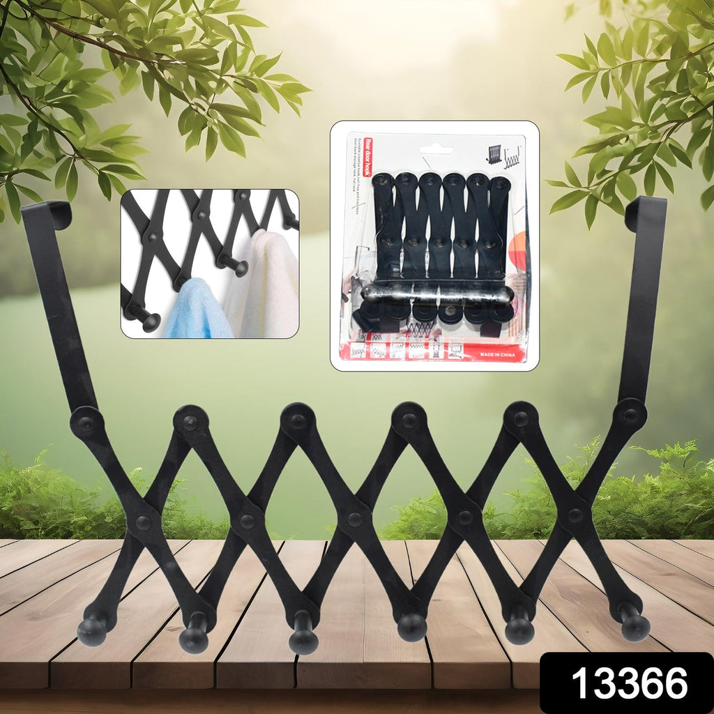 Black steel over-the-door coat rack with 6 hooks, organizing coats and bags.