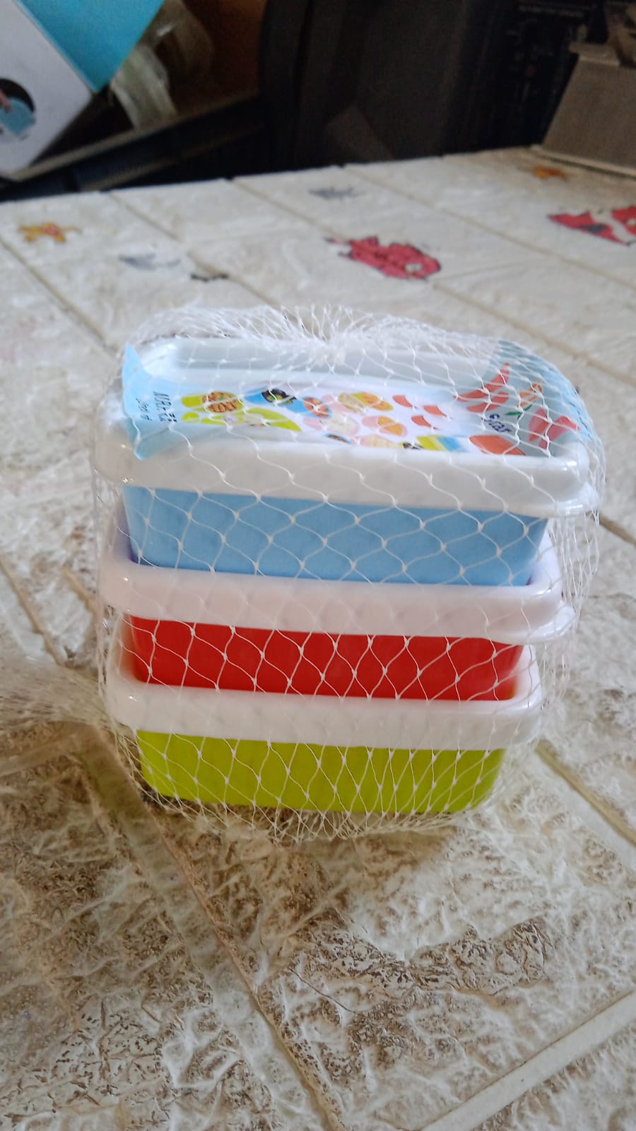 Close-up detail of a single airtight food container and its lid.