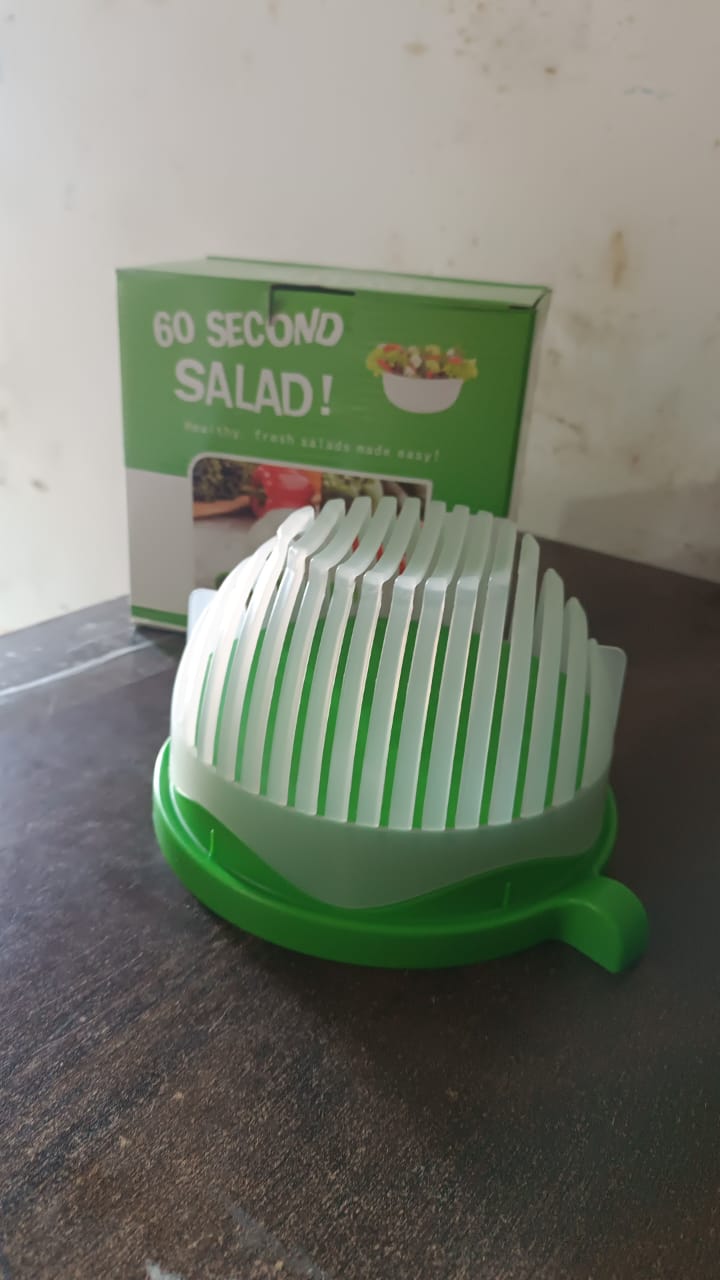 Retail packaging for the Quickslice 60 Seconds Salad Cutter Bowl.