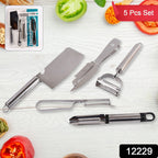 Hand using the julienne peeler on a carrot for fine vegetable strips