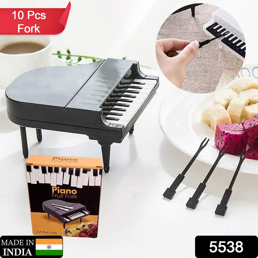 Colorful fruits arranged with the unique piano-shaped dessert picks for a vibrant presentation.